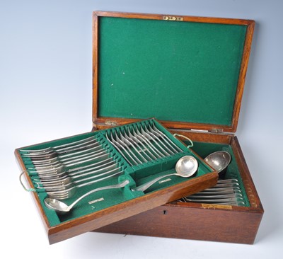 Lot 2174 - A cased Edwardian silver cutlery suite, in the...