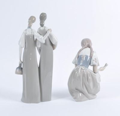 Lot 2 - A Lladro porcelain figure group of two women,...