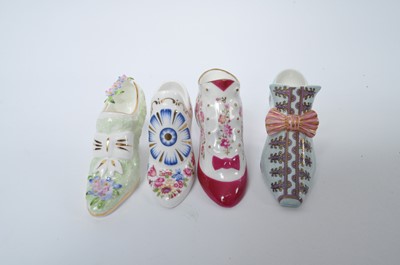 Lot 71 - A box of miniature shoes, to include porcelain...