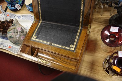 Lot 112 - A Victorian walnut and brass mounted writing...
