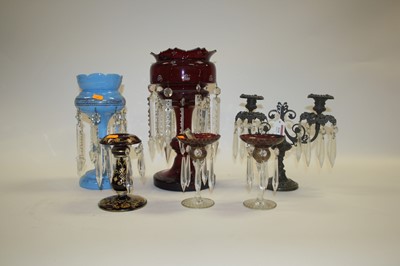 Lot 114 - A Victorian cranberry glass table lustre,...