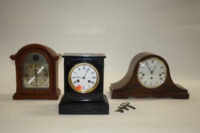Lot 131 - A Victorian black slate eight-day mantel clock,...