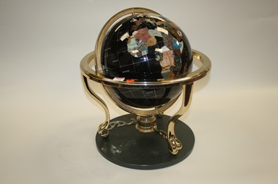 Lot 145 - A polished hardstone inlaid terrestrial globe,...