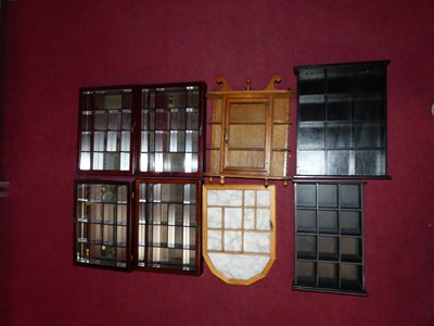 Lot 165 - A collection of wooden wall-mounted display...