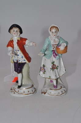 Lot 199 - Four Sitzendorf hard paste porcelain figures,...