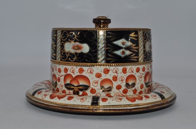 Lot 203 - A 19th century imari palette cheese dish and...