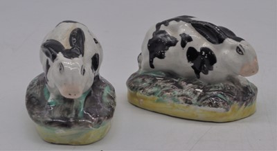 Lot 217 - A pair of 19th century Staffordshire models of...