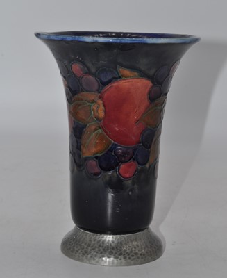 Lot 231 - A Moorcroft Pomegranate pattern vase, upon a...