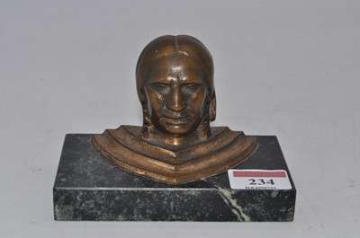 Lot 234 - A bronzed paperweight in the form of a head...
