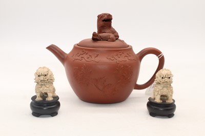 Lot 241 - A Chinese Yixing red-ware teapot, the lid...
