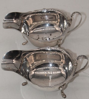 Lot 250 - A pair of Elizabeth II silver helmet shaped...