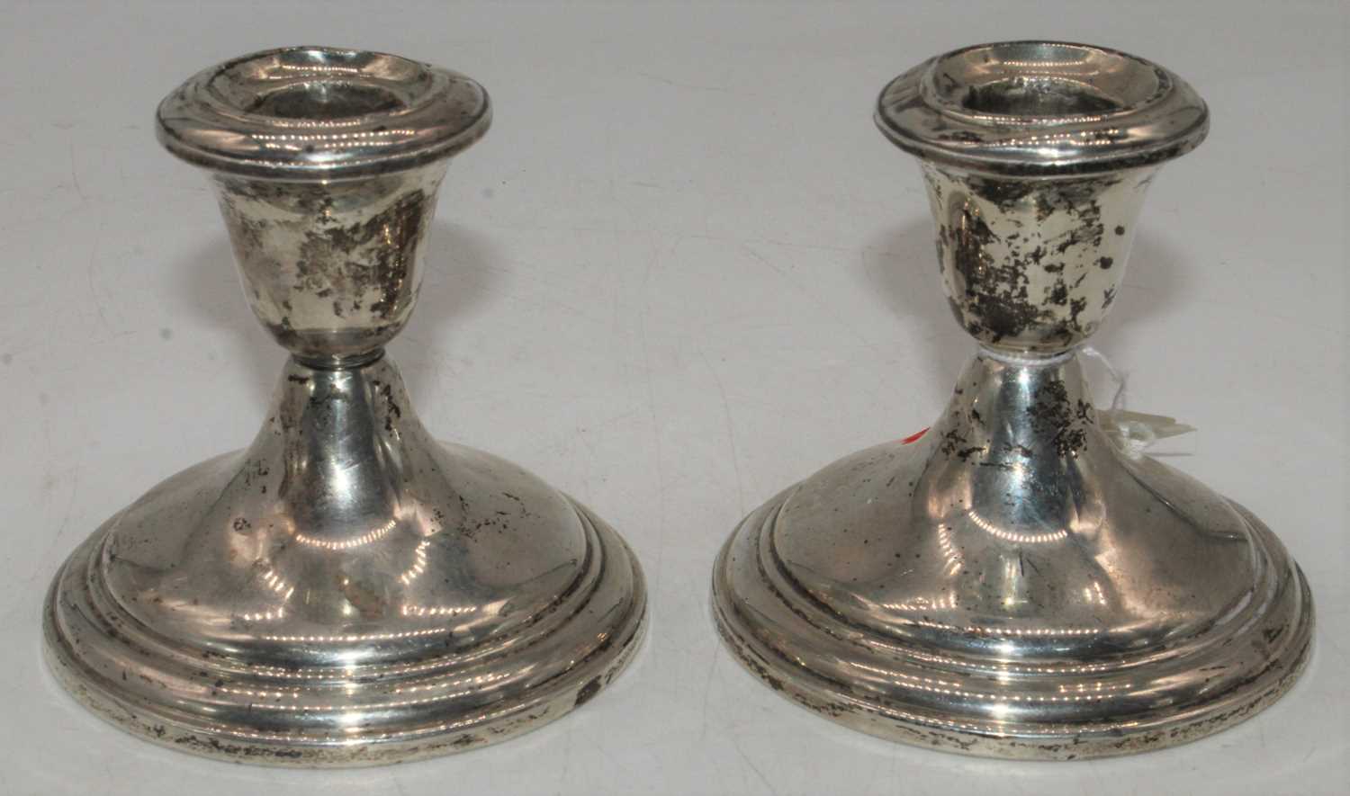 Lot 257 - A pair of Alvin loaded sterling silver dwarf...