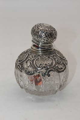 Lot 258 - A Victorian silver mounted cut glass scent...