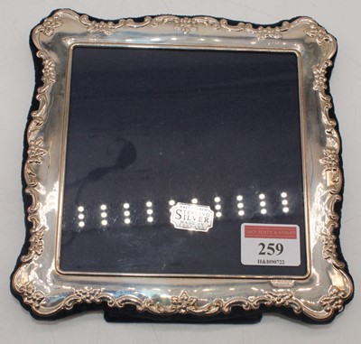 Lot 259 - An Elizabeth II silver clad easel photograph...