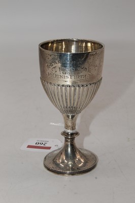 Lot 260 - A George V silver cup, of half-gadrooned form,...