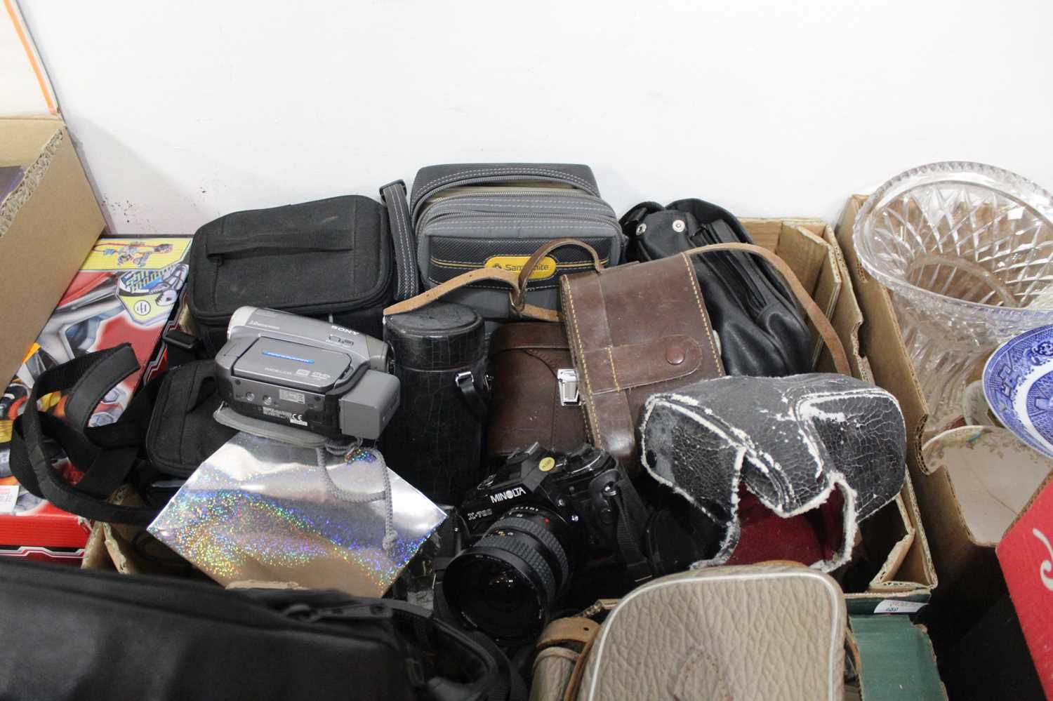 Lot 680 - Two boxes of assorted cameras and accessories...