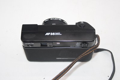 Lot 608 - A collection of cameras and accessories to...