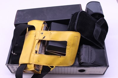 Lot 608 - A collection of cameras and accessories to...
