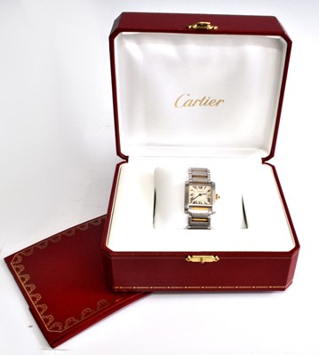 Lot 2245 - A steel and yellow Cartier Tank Francaise...