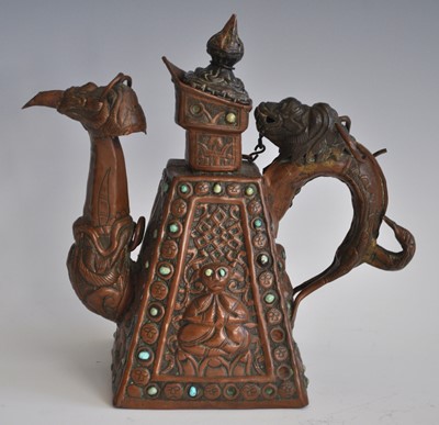 Lot 2449 - A Buddhist ritual copper ewer, the handle and...