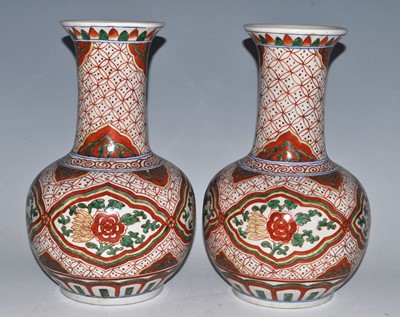 Lot 177 - A pair of Chinese Wucai vases, each having a...