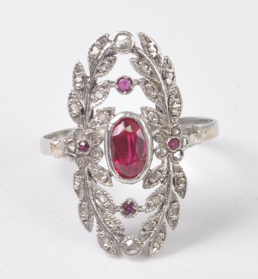 Lot 2508 - A white metal, synthetic ruby and diamond...