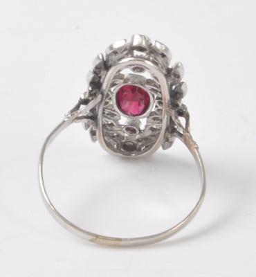 Lot 2508 - A white metal, synthetic ruby and diamond...