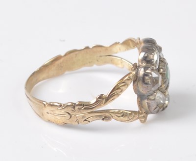 Lot 2509 - A yellow and white metal, emerald and diamond...