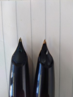 Lot 110 - A Sheaffer PFM fountain pen, in black with 14k...
