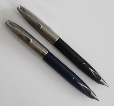Lot 113 - Two Sheaffer PFM fountain pens, in dark blue...