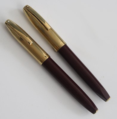 Lot 117 - Two Sheaffer PFM V fountain pens, made in...