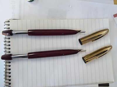 Lot 117 - Two Sheaffer PFM V fountain pens, made in...