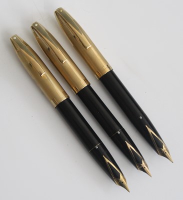 Lot 118 - Three Sheaffer PFM V fountain pens, in black...