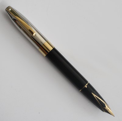 Lot 140 - A cased Sheaffer Legacy fountain pen, in black...