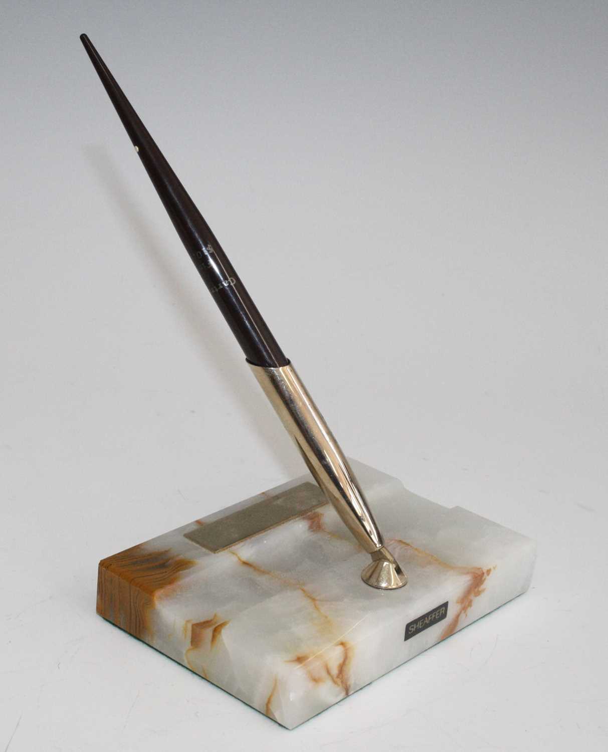 Lot 187 - A Sheaffer fountain pen desk stand, the pen in...
