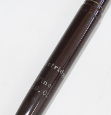 Lot 187 - A Sheaffer fountain pen desk stand, the pen in...