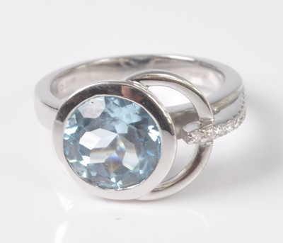 Lot 2204 - An 18ct white gold, aquamarine and diamond...