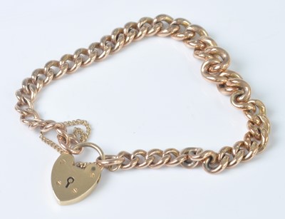 Lot 2516 - A 9ct rose gold graduated curblink bracelet,...