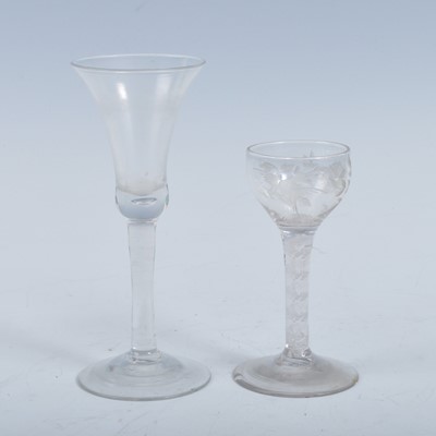 Lot 2113 - A circa 1740 wine glass, the waisted bell bowl...