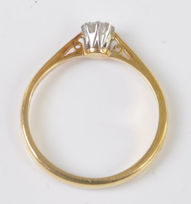 Lot 2522 - An 18ct yellow and white gold diamond single...