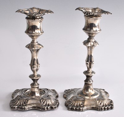 Lot 2172 - A pair of late Victorian silver candlesticks,...