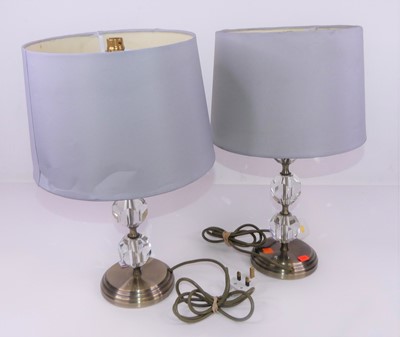 Lot 2 - A pair of modern table lamps having facet cut...