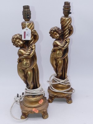 Lot 14 - A pair of reproduction gilt figural...