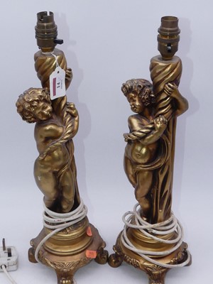 Lot 14 - A pair of reproduction gilt figural...