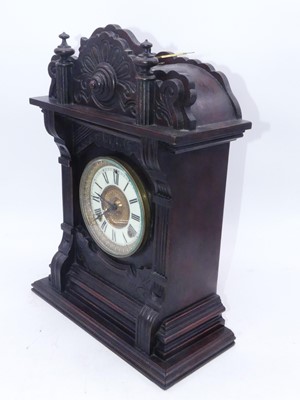 Lot 22 - A late 19th century American walnut cased...