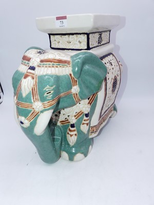 Lot 73 - A reproduction ceramic plant stand in the form...