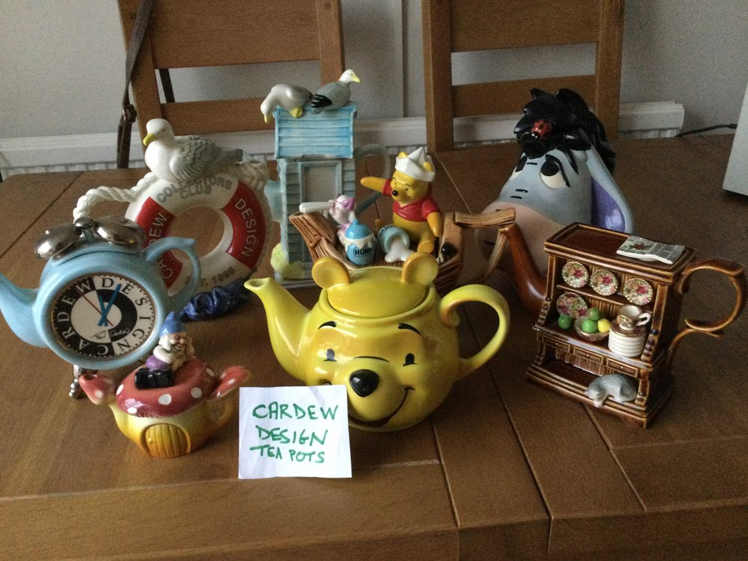 Lot 94 - Two boxes of assorted novelty teapots, to...