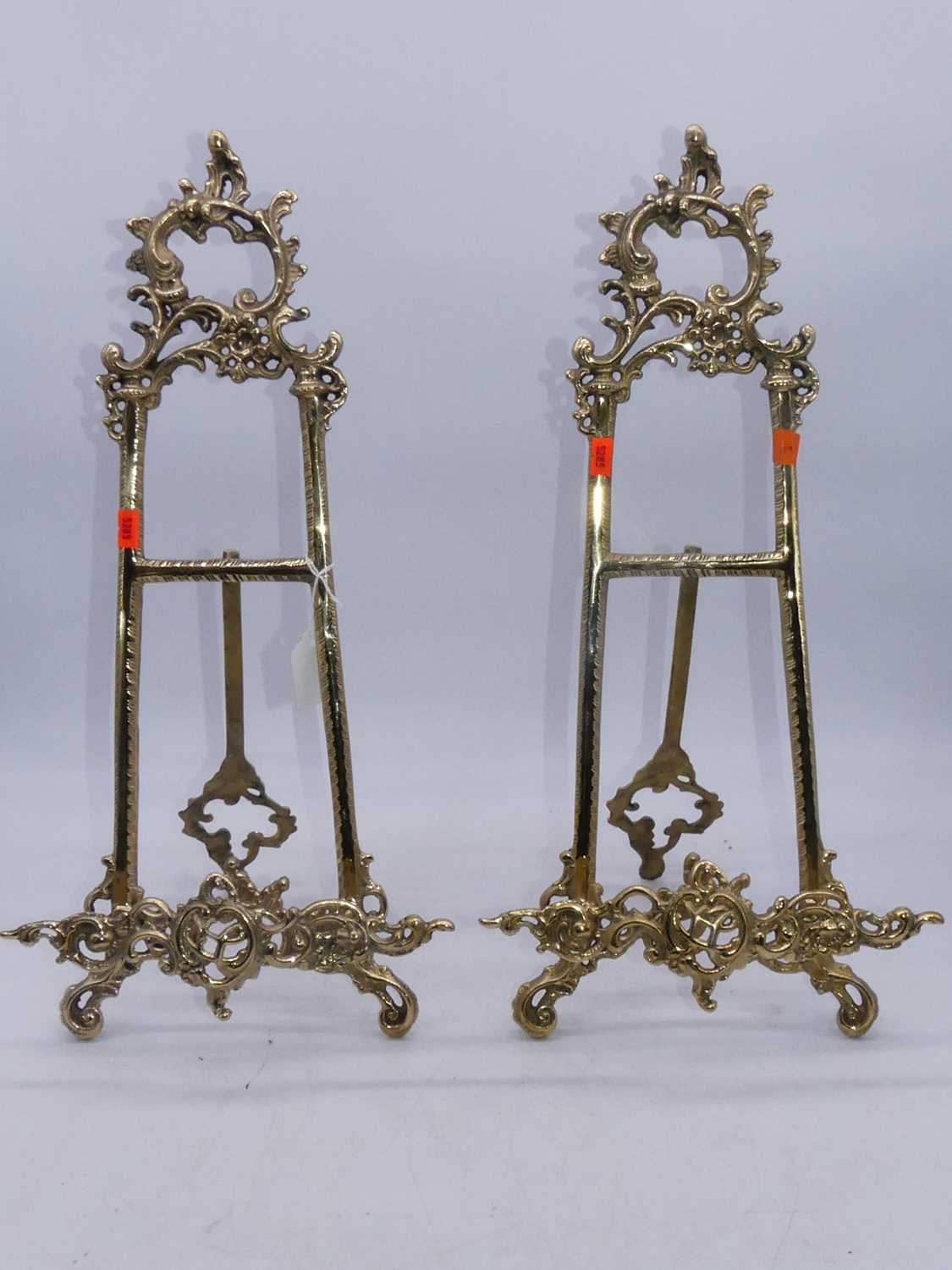 Lot 109 - A pair of reproduction brass Rococo style...
