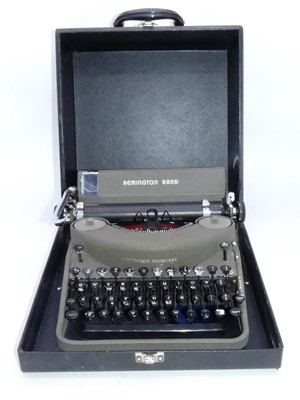 Lot 185 - A Remington Rand portable typewriter, in...