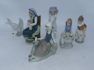 Lot 209 - A Lladro Spanish porcelain figure of a young...